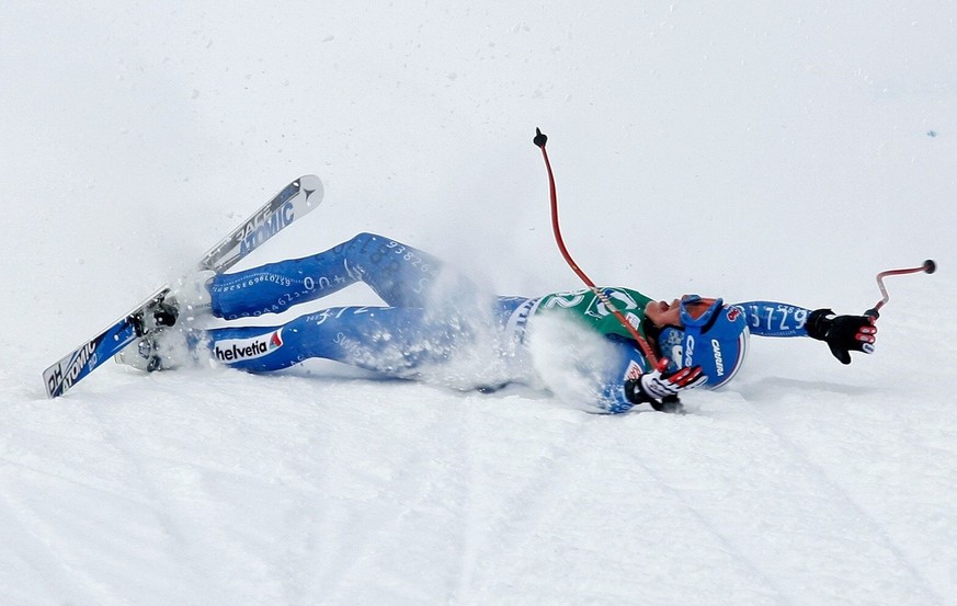 Lara Gut from Switzerland celebrates her third place after she crashed shortly before the finish area at the Women&#039;s World Cup downhill race in St. Moritz, Switzerland, Saturday, February 02, 200 ...