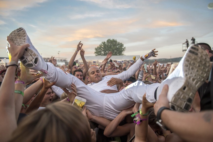 epa05413920 Musician Walshy Fire of US electronic music group Major Lazer performs during the 22nd Openair Frauenfeld music festival, in Frauenfeld, Switzerland, 07 July 2016. The event takes place fr ...