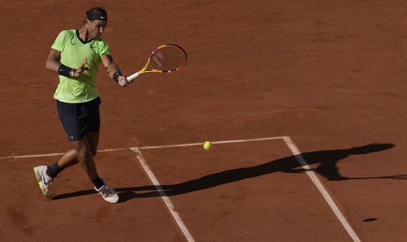 Spain&#039;s Rafael Nadal plays a return to Australia&#039;s Alexei Popyrin during their first round match on day three of the French Open tennis tournament at Roland Garros in Paris, France, Tuesday, ...