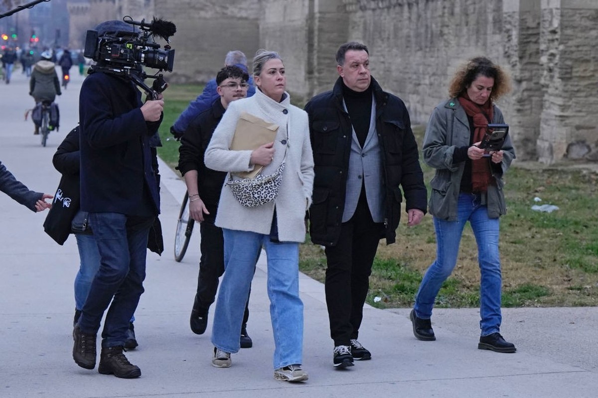AVIGNON, FRANCE - DECEMBER 19: Caroline Darian and David Pelicot, daughter and son of Gisele and Dominique Pelicot, walk outside the courthouse before a verdict in the Pelicot case on December 19, 202 ...