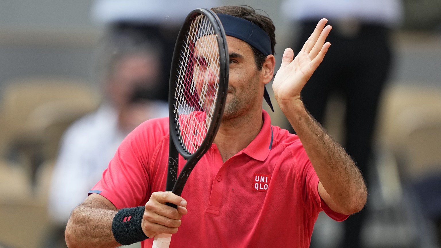 Switzerland&#039;s Roger Federer celebrates after defeating Croatia&#039;s Marin Cilic in their second round match on day 5, of the French Open tennis tournament at Roland Garros in Paris, France, Thu ...