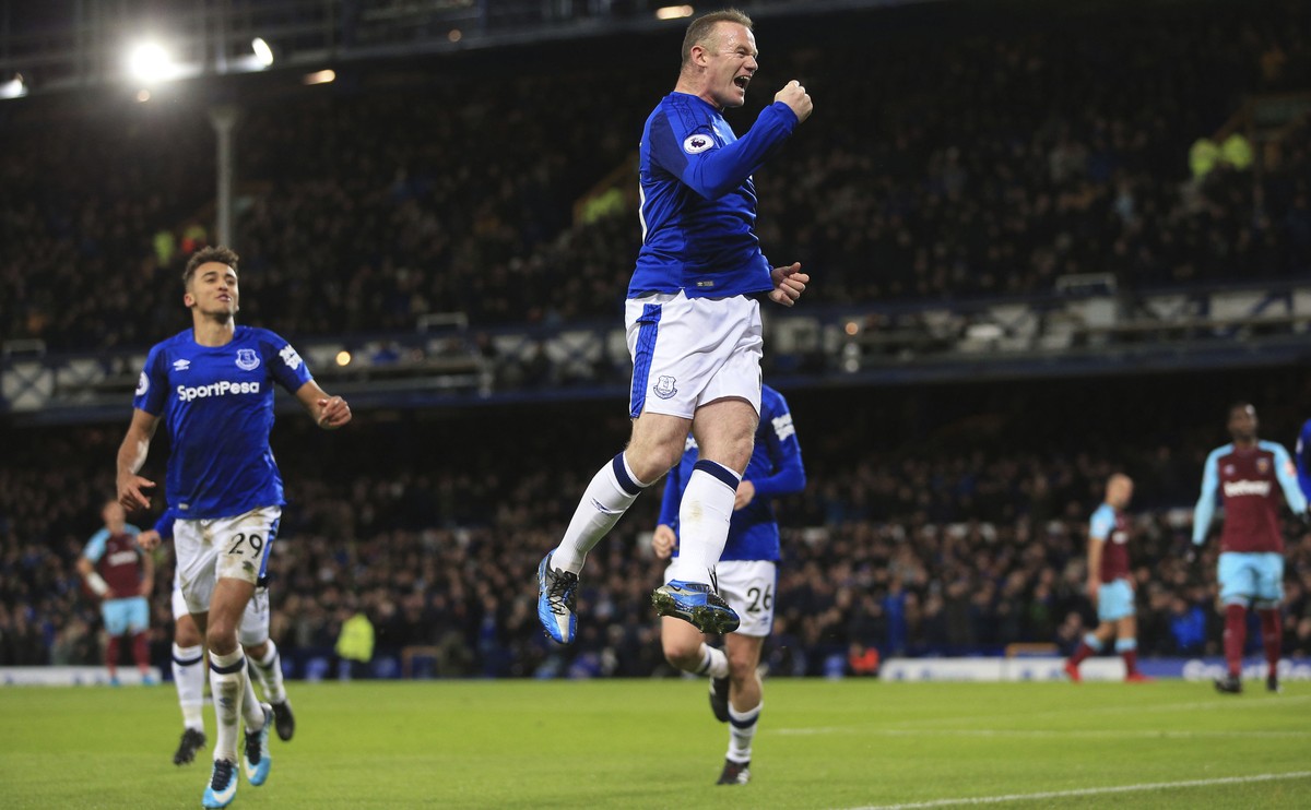 Everton's Wayne Rooney celebrates scoring his side's first goal against West Ham United during the English Premier League soccer match at Goodison Park, Liverpool, England, Wednesday Nov. 29 ...