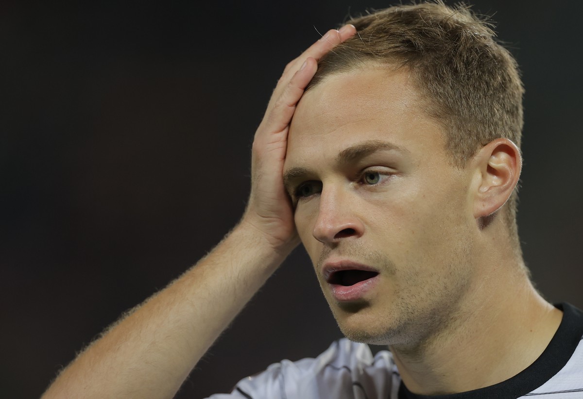 epa09519070 Germany's Joshua Kimmich reacts during the FIFA World Cup 2022 qualifying soccer match between North Macedonia and Germany in Skopje, Republic of North Macedonia 11 October 2021. EPA/ ...