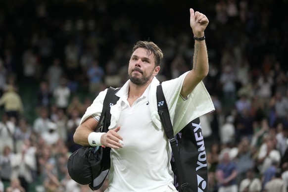 Switzerland&#039;s Stan Wawrinka leaves the court after losing to Serbia&#039;s Novak Djokovic in a men&#039;s singles match on day five of the Wimbledon tennis championships in London, Friday, July 7 ...