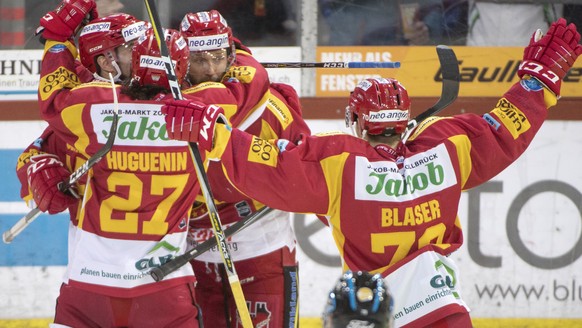 Langnaus Nils Berger, Emanuel Peter, Anthony Huguenin und Yannick Blaser, von links, jubeln waehrend dem Meisterschaftsspiel der National League zwischen den SCL Tigers und dem HC Davos, am Donnerstag ...