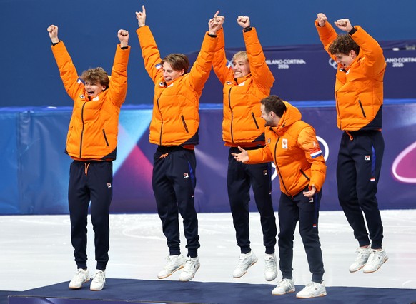 epa12763809 Gold medalist the Netherlands during the medal ceremony for the Men's 5000m Relay of the Short Track Speed Skating competitions at the Milano Cortina 2026 Winter Olympic Games, in Mil ...