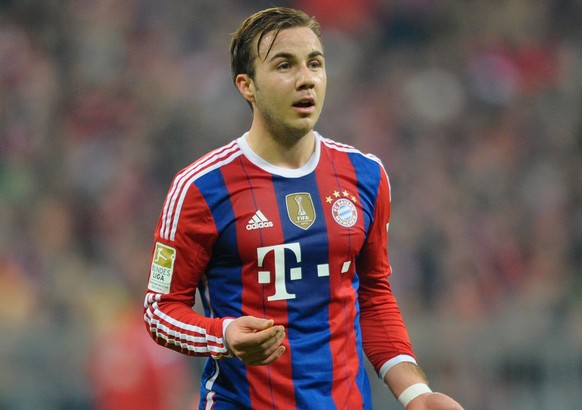 MUNICH, GERMANY - DECEMBER 16: Mario Goetze of Muenchen reacts during the Bundesliga match between FC Bayern Muenchen and SC Freiburg at Allianz Arena on December 16, 2014 in Munich, Germany. (Photo b ...