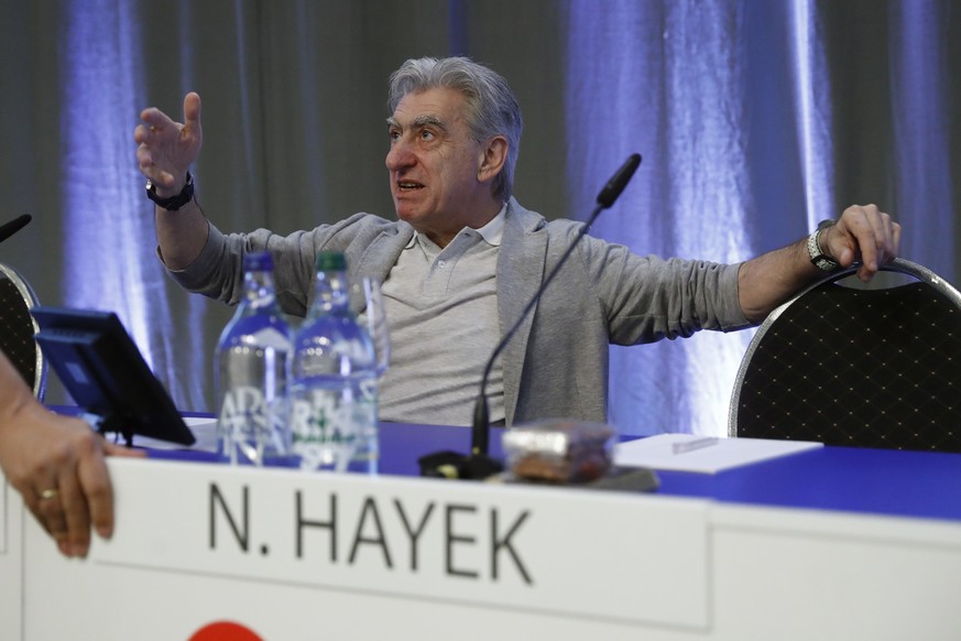 epa07593450 Nick Hayek, CEO Swatch Group, speaks to a participant, ahead of the ordinary general meeting of shareholders of Swatch Group at the Tissot Velodrome, in Grenchen, Switzerland, 23 May 2019. ...