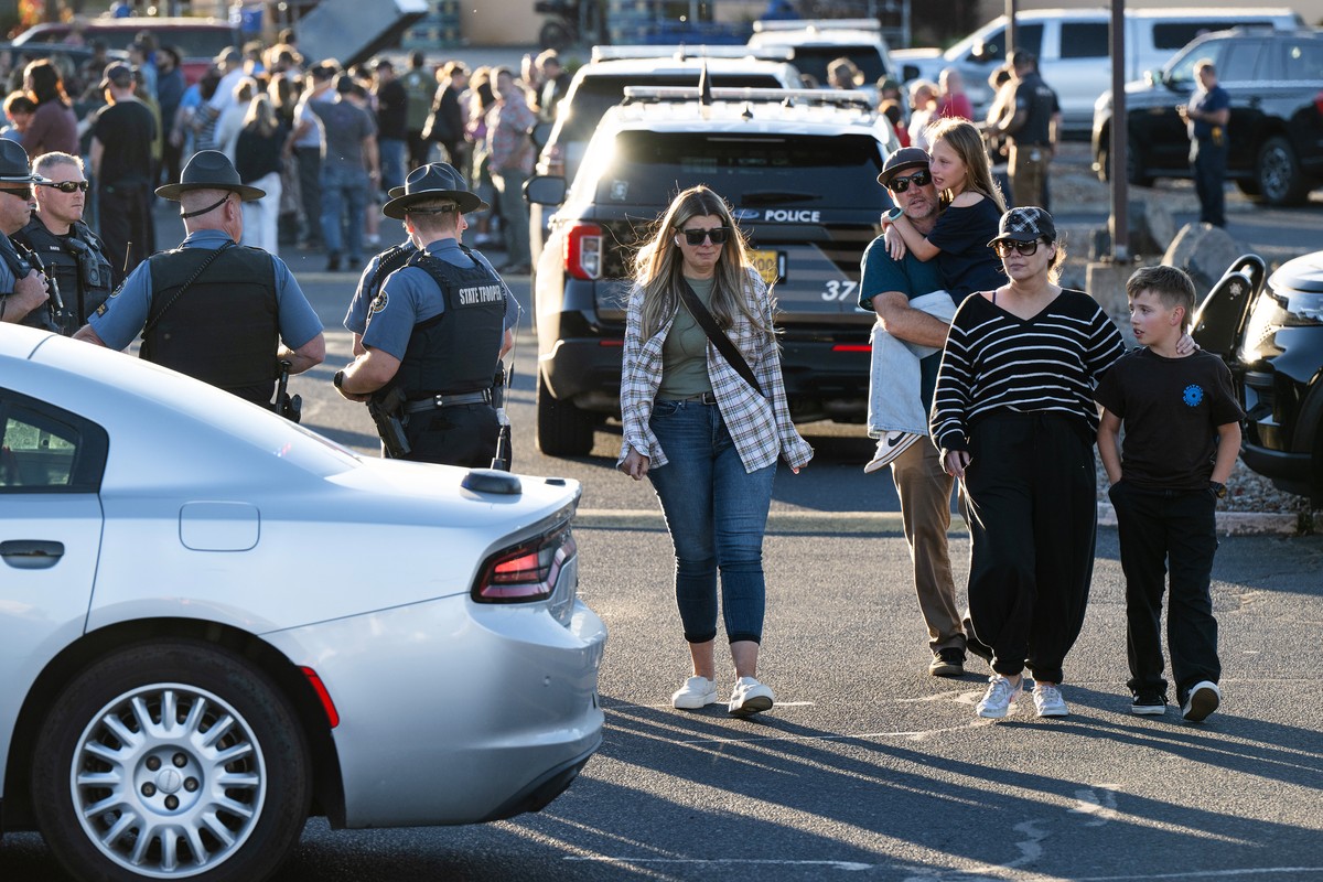 People leave a family meeting area following a shooting at Silver Rail Elementary School, Thursday, Oct. 15, 2026, in Bend, Ore. (AP Photo/Joe Kline)
Oregon School Shooting