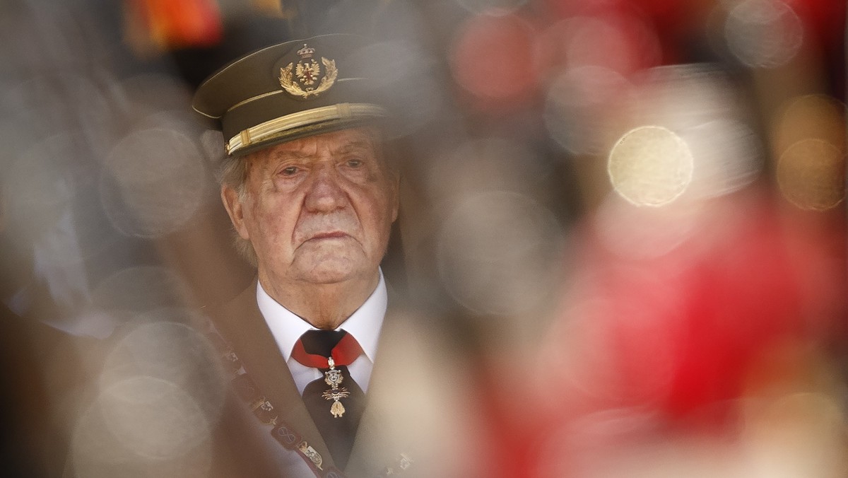 FILE - In this June 3, 2014 file photo then King Juan Carlos attends a military ceremony in San Lorenzo de El Escorial, outside Madrid, Spain. The royal family's website on Monday Aug. 3, 2020, p ...