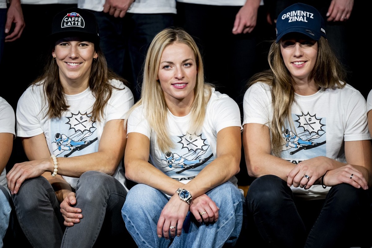 Skiracers Wendy Holdener, Lara Gut-Behrami and Camille Rast of Switzerland react during a press conference at the FIS Alpine Skiing World Cup season opener, in Soelden, Austria, Thursday, October 24,  ...