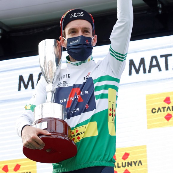 epa09101428 British rider Adam Yates of Ineos Grnadiers team celebrates on the podium retaining the overall leader&#039;s jersey after the sixth stage of La Volta a Catalunya cycling race over 193.8 k ...