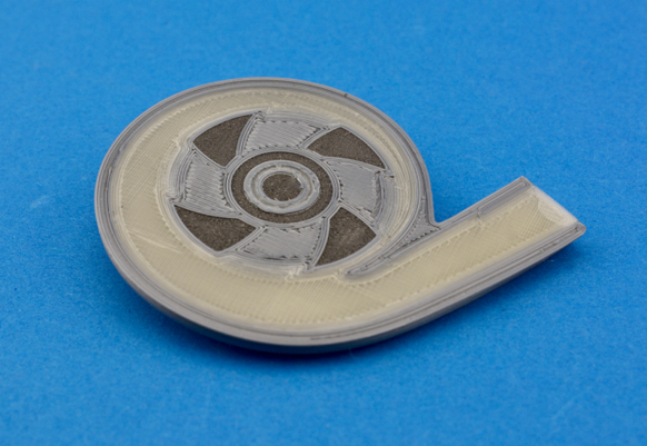 Der Querschnitt einer 3D-gedruckten Herzpumpe mit den dunkelgrauen Magneten.&nbsp;