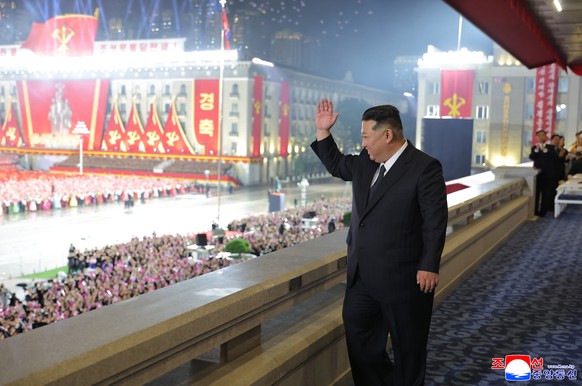 epa12446337 A photo released by the official Korean Central News Agency (KCNA) shows North Korean leader Kim Jong Un attending a military parade to celebrate the 80th founding anniversary of the Worke ...