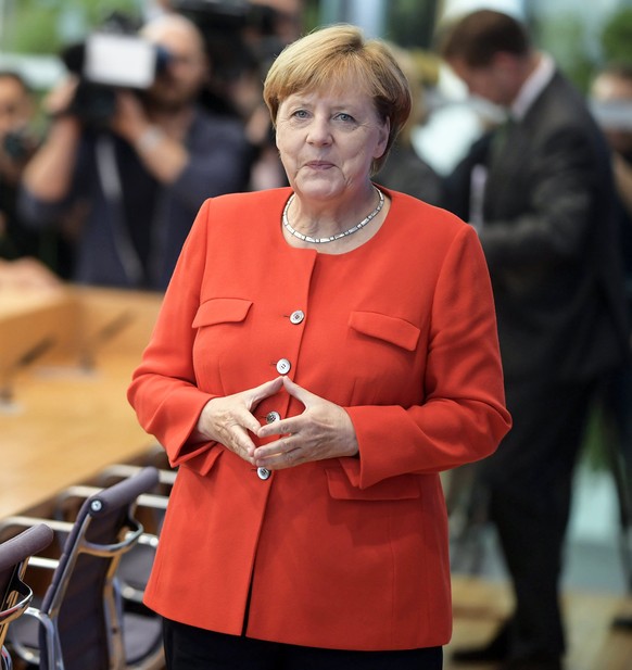 epaselect epa06169658 German Chancellor Angela Merkel arrives for her annual press conference at 'Bundespressekonferenz' in Berlin, Germany, 29 August 2017. The traditional media briefing is ...