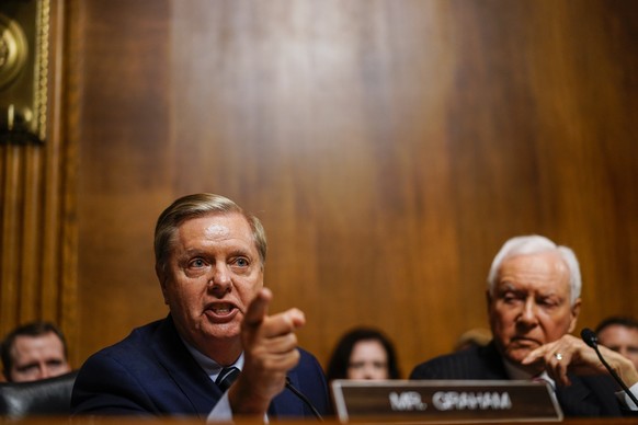 epa07053018 Senator Lindsey O. Graham (L) during the Senate Judiciary Committee hearing on the nomination of Brett Kavanaugh to be an associate justice of the Supreme Court of the United States, on Ca ...