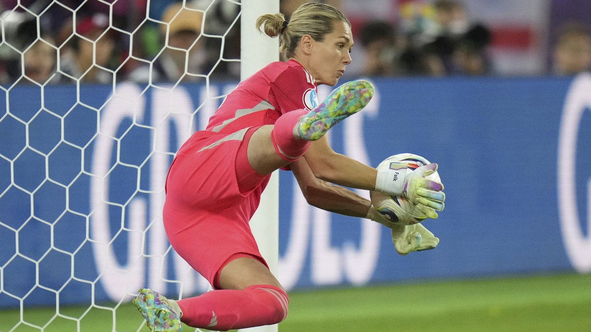 Sweden goalkeeper Jennifer Falk stops a penalty during a penalty shootout at the end of the Women's Euro 2025 quarterfinals soccer match between Sweden and England at Stadion Letzigrund in Zurich ...