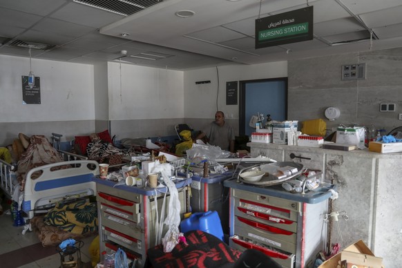 Wounded Palestinians lie in Shifa Hospital in Gaza City on Friday, Nov. 24, 2023, as the temporary ceasefire between Israel and Hamas took effect. (AP Photo/Mohammed Hajjar)