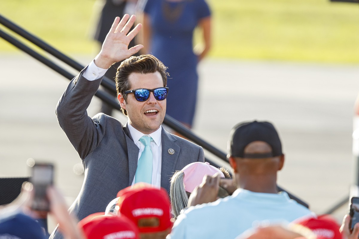 epa08769184 US Representative for Florida, Republican Matt Gaetz, waves to the crowd while waiting for US President Donald J. Trump during a campaign rally in Pensacola, Florida, USA, on 23 October 20 ...