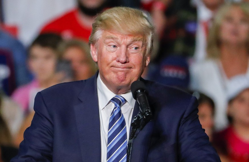 epa05585871 US Republican presidential nominee Donald Trump speaks during a campaign rally in Charlotte, North Carolina, USA, 14 October 2016. The US presidential election is scheduled for 08 November ...