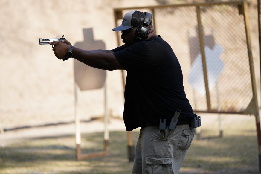 May 26, 2021, Ruskin, Florida, USA: Jabari Hunt participates in a range-wide competition, representing Black Gun Owners and Education BGOE at Gun Craft shooting range. The competition takes shooters t ...