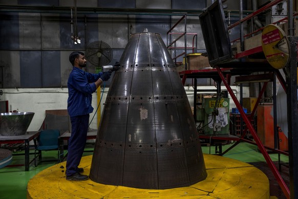 CORRECTS DATE TO JULY 10 - A worker is seen engaged in the manufacturing of components for Indian Space Research Organisation (ISRO) at a facility of Godrej Aerospace in Mumbai, India, Monday, July 10 ...
