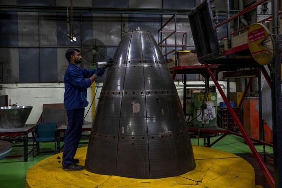 CORRECTS DATE TO JULY 10 - A worker is manufacturing components for the Indian Space Research Organization (ISRO) at a Godrej Aerospace facility in Mumbai, India, Monday, July 10…