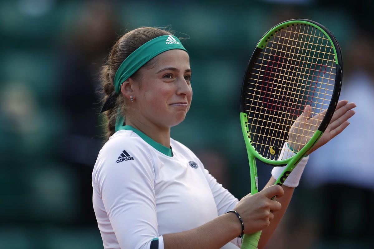 Latvia's Jelena Ostapenko celebrates winning her quarterfinal match of the French Open tennis tournament against Denmark's Caroline Wozniacki in three sets 4-6, 6-2, 6-2, at the Roland Garro ...