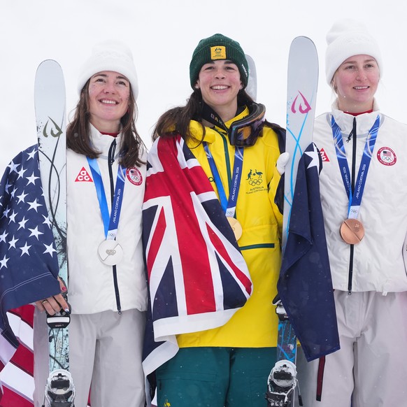 From left, silver medalist United States' Jaelin Kauf, gold medalist Australia's Jakara Anthony, and bronze medalist United States' Elizabeth Lemley celebrate after the women's fre ...