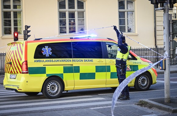 Emergency services attend the scene at a school in Malmo, Sweden on Monday, March 21, 2022. Swedish police said Monday at least two people were injured and one person has been arrested in Malmo, after ...