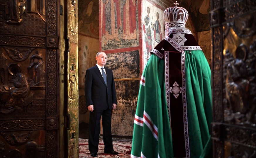 May 7, 2018 - Moscow, Russia - Russian President Vladimir Putin takes part in a thanksgiving service held by Orthodox Patriarch Kirill at the Annunciation Cathedral in the Kremlin May 7, 2018 in Mosco ...