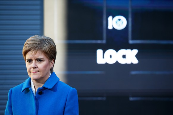 epa10685443 (FILE) - Scottish National Party (SNP) leader Nicola Sturgeon joins candidates on the campaign trail at Clarke Fire Services, Coatbridge, Lanarkshire, Scotland, Britain, 09 December 2019 ( ...