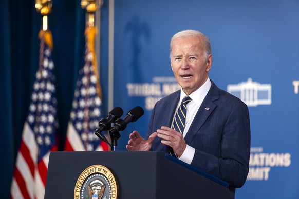 epa11014332 US President Joe Biden speaks at the White House Tribal Nations Summit at the Department of Interior in Washington, DC, USA, 06 December 2023. Biden used the opportunity to sign an executi ...