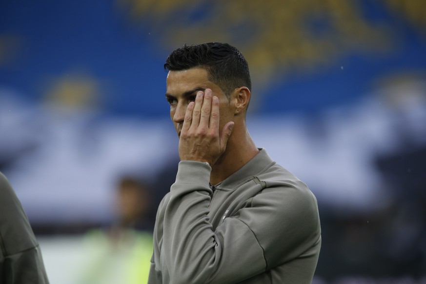 Juventus forward Cristiano Ronaldo warms up prior to the Serie A soccer match between Udinese and Juventus, at the Dacia Arena stadium in Udine, Italy, Saturday, Oct.6, 2018. Cristiano Ronaldo is back ...