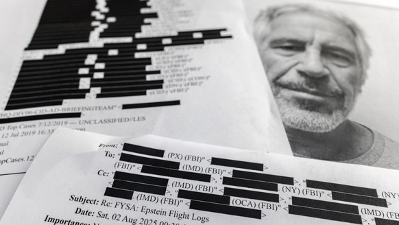 epa12724191 (ILLUSTRATION) - Printed copies of the Jeffrey Epstein files in Miami, Florida, 10 February 2026. According to official charges and court records released under the Epstein Files Transpare ...