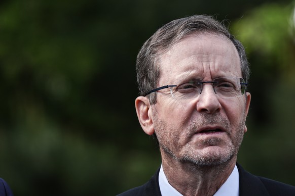 epa12094277 Israeli President Isaac Herzog attends a memorial event commemorating the deportation of Jews during World War II at the Platform 17 Memorial at Grunewald railway station in Berlin, German ...