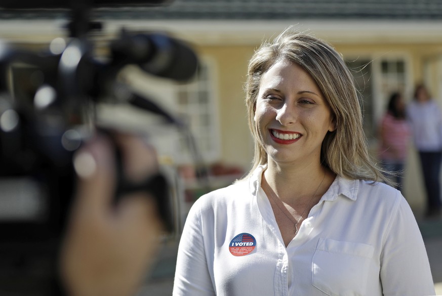 FILE - In this Nov. 6, 2018 file photo, Katie Hill, then a Democratic Party candidate from California&#039;s 25th Congressional district, talks to a reporter after voting in her hometown of Agua Dulce ...