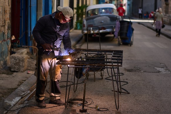 A blacksmith welds a door in Havana, Cuba, Tuesday, June 9, 2026. (AP Photo/Ramon Espinosa)
APTOPIX Cuba Daily Life