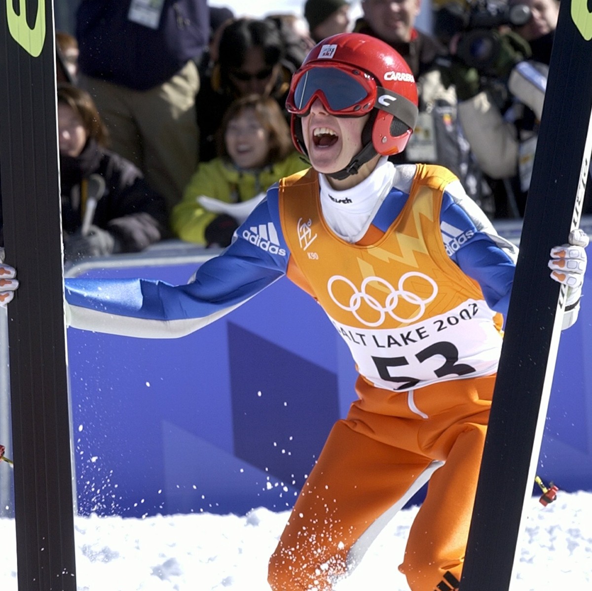 Simon Ammann of Switzerland celebrates his gold medal winning jump after the K90 Individual ski jump at the 2002 Salt Lake City Winter Olympics in Park City, Utah, Sunday, Feb. 10, 2002. (KEYSTONE/Kar ...