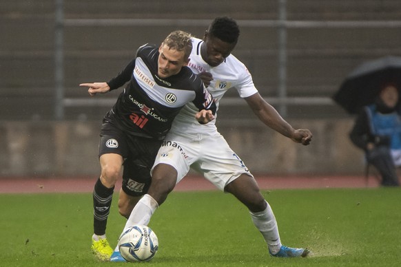 From left, Lugano&#039;s player Mattia Bottani and Zurich&#039;s player Aiyegun Tosin, during the Super League soccer match FC Lugano against FC Zurich, at the Cornaredo stadium in Lugano, Sunday Octo ...