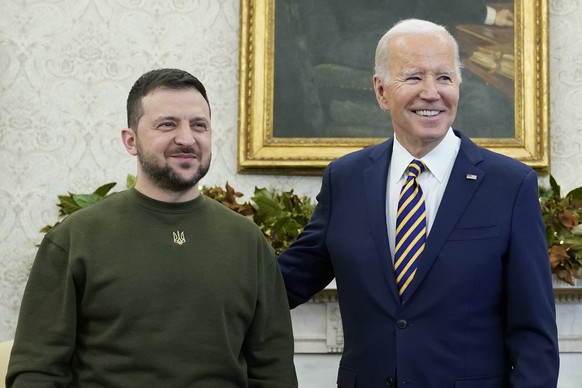 FILE ? U.S. President Joe Biden meets with Ukrainian President Volodymyr Zelenskyy at the White House, Wednesday, Dec. 21, 2022, in Washington. As chances rise of a Biden-Donald Trump rematch in the U ...