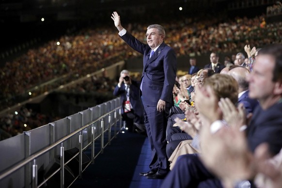 International Olympic Committee President Thomas Bach waves as he is introduced during the opening ceremony for the 2016 Summer Olympics in Rio de Janeiro, Brazil, Friday, Aug. 5, 2016. REUTERS/Mark H ...