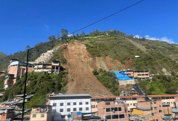 epa09827155 A view of the landslide on a hill in the Retamas locality, located in the district of Parcoy, the province of Pataz in the La Libertad region of Lima, Peru, 15 March 2022. The landslide ca ...