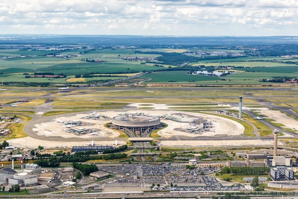 Paris Charles de Gaulle CDG Airport Terminal 1 aerial view in France, Paris, France - June 6, 2022: Aerial view of Charles de Gaulle airport Terminal 1 in Paris, France., Paris, France - June 6, 2022: ...