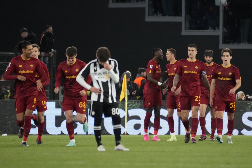 Roma&#039;s Tammy Abraham, centre, celebrates with teammates after scoring his side&#039;s third goal during the Serie A soccer match between Roma and Udinese at Rome&#039;s Olympic Stadium, Sunday, A ...