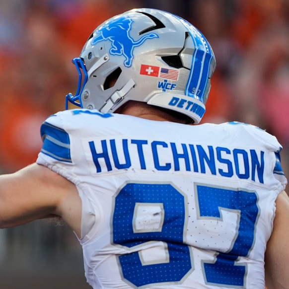 Detroit Lions defensive end Aidan Hutchinson (97) grabs Cincinnati Bengals quarterback Jake Browning (6) by the facemask during the first half of an NFL football game Sunday, Oct. 5, 2025, in Cincinna ...
