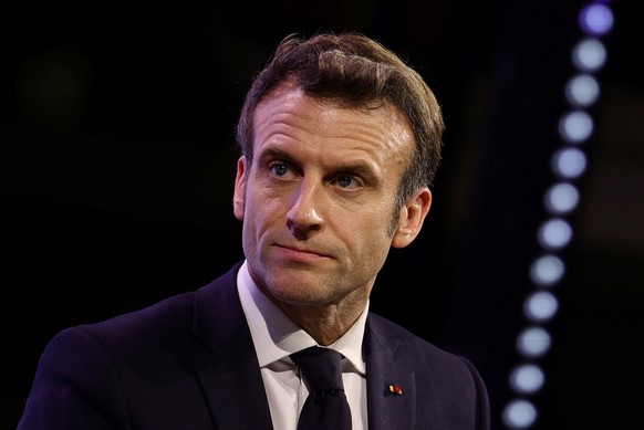 epa09763395 French President Emmanuel Macron attends the conference &#039;Investing together, for a new alliance between Africa and Europe&#039; organised by the French Development Agency (AFD) at Sta ...