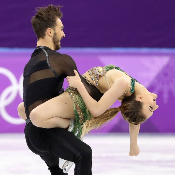 epa06541754 Gabriella Papadakis and Guillaume Cizeron of France in action during the Ice Dance Short Dance of the Figure Skating competition at the Gangneung Ice Arena during the PyeongChang 2018 Olym ...