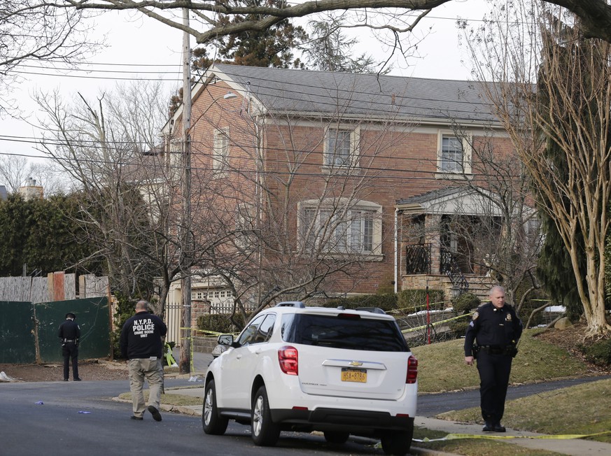 Police work near the scene where an alleged leader of the Gambino crime family was shot and killed in the Staten Island borough of New York, Thursday, March 14, 2019. Francesco &quot;Franky Boy&quot;  ...