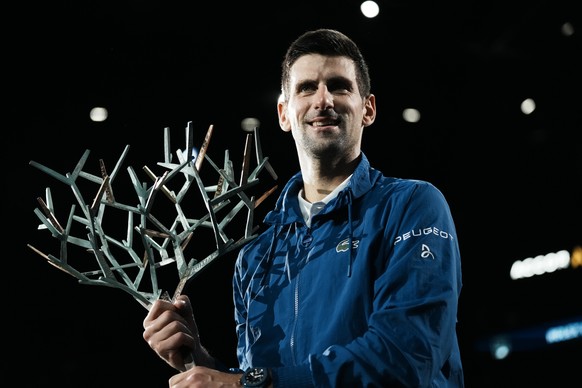 Serbia&#039;s Novak Djokovic holds his trophy after defeating Russia&#039;s Daniil Medvedev in the final match of the Paris Masters tennis tournament at the Accor Arena in Paris, Sunday, Nov.7, 2021.  ...